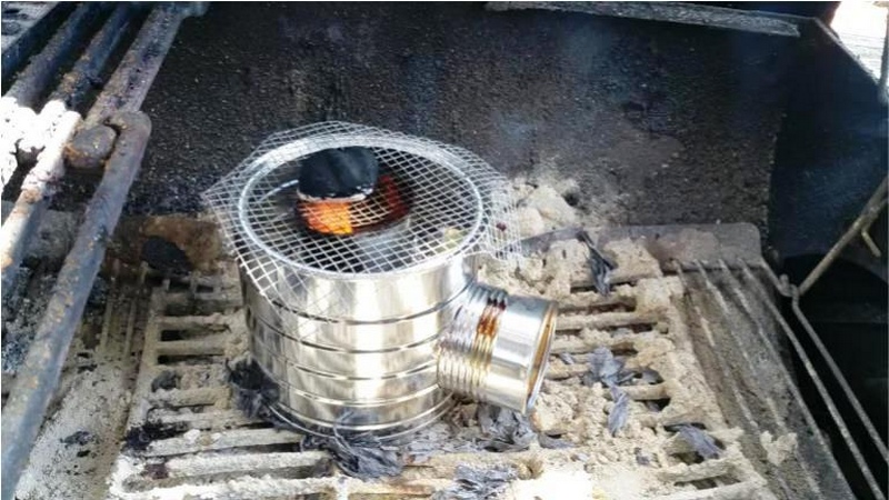 A DIY Rocket Stove from Recycled Cans